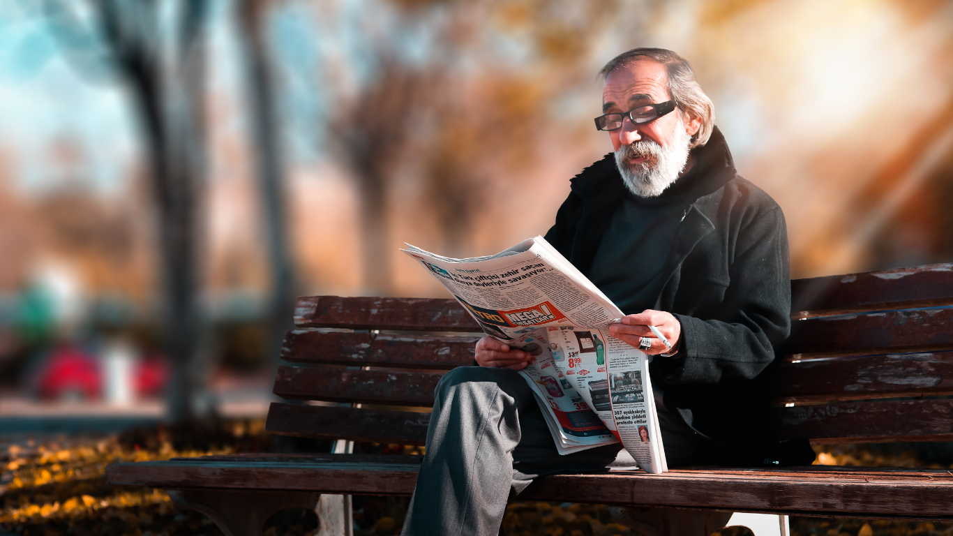 Man reading newspaper